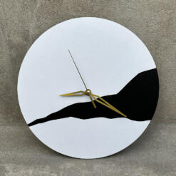 white stone wall clock